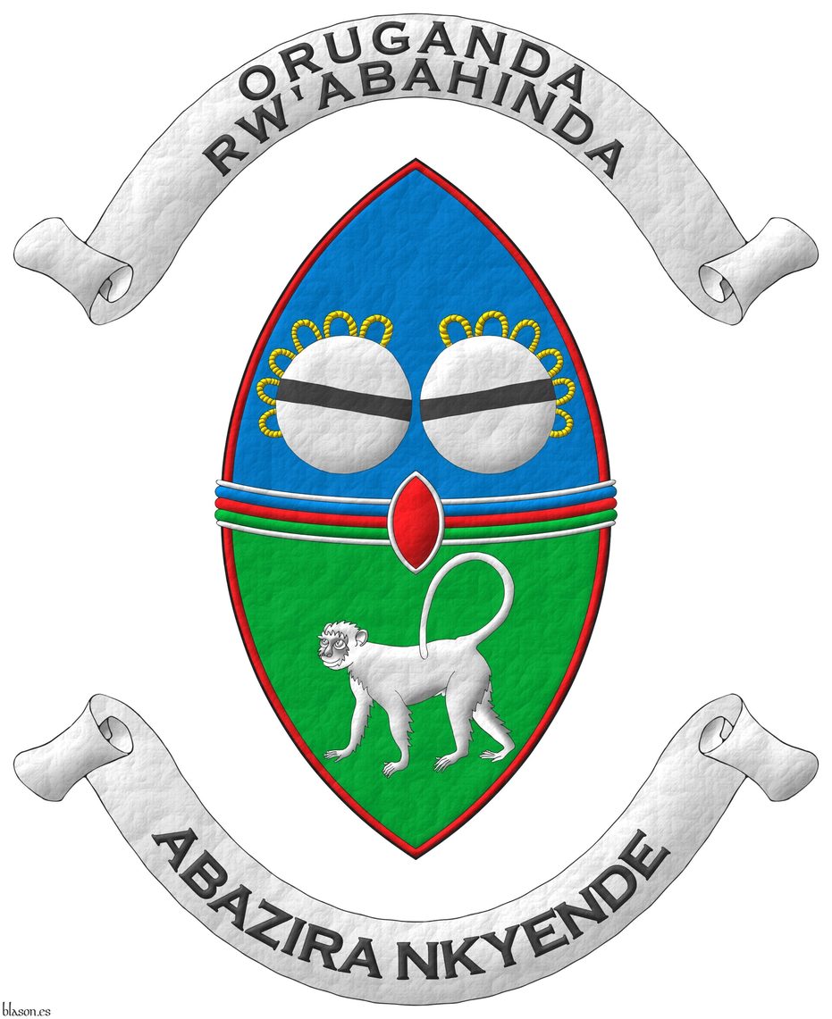 Party per fess, fimbriated Gules: 1<sup>st</sup> Azure, two royal drums in fess Argent, stringed Or, each charged with a bar Sable; 2<sup>nd</sup> Vert, a monkey statant Argent; overall a fess tierced per fess Azure, Gules, and Vert, fimbriated Argent; overall an inescutcheon Gules, fimbriated Argent. Motto above the crest: �Oruganda Rw'Abahinda� in letters Sable over a scroll Argent. Motto: �Abazira Nkyende� in letters Sable upon a scroll Argent.