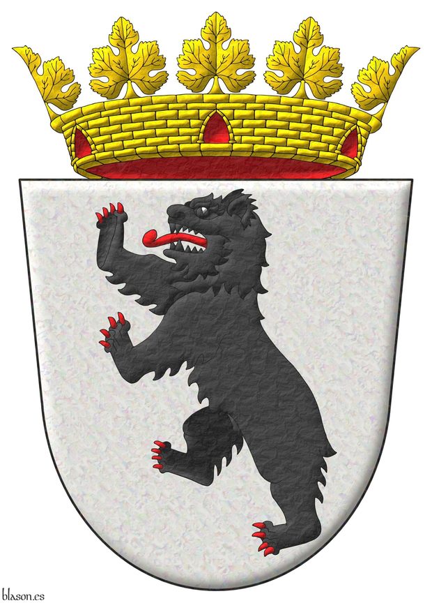 Escudo de plata, un oso rampante de sable, lampasado y armado de Gules. Timbrado de una corona mural con ocho hojas de parra, visibles cinco, de oro.