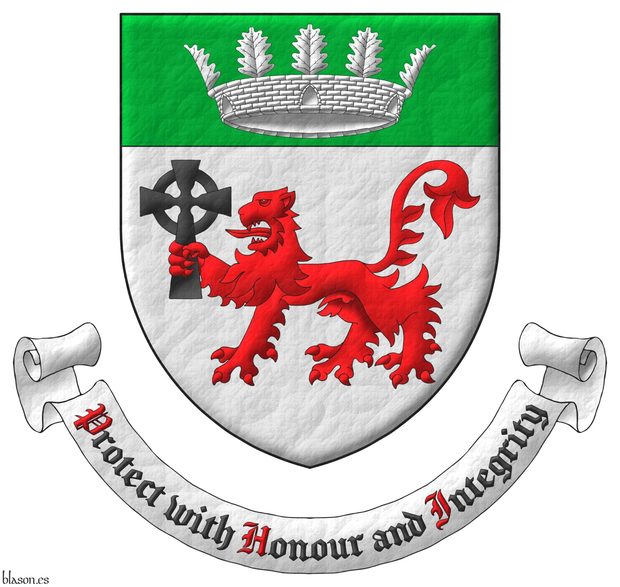 Argent, a lion passant Gules, grasping a Celtic cross Sable in its dexter forepaw, on a chief Vert, a mural crown with five visible oak leaves Argent. Motto: Protect with Honour and Integrity Sable, with initial letters Gules, over a scroll Argent.