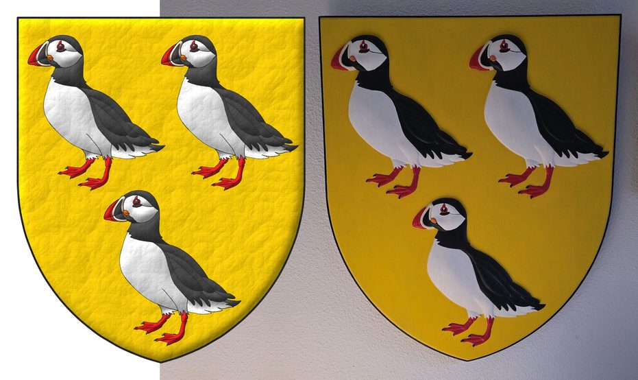 Escudo de oro, tres frailecillos (Fratercula arctica) al natural.