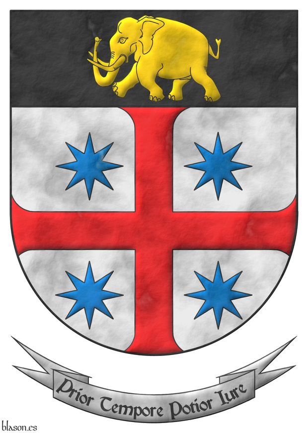 Escudo de plata, una estrecha patada de gules, cantonada de cuatro estrellas de ocho puntas de azur; en un jefe de sable, un elefante pasante de oro. Lema: Prior tempore potior iure