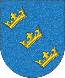Escudo de azur, tres coronas en banda, puestas en banda de oro.