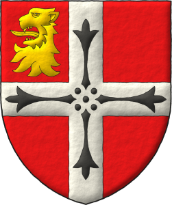 Escudo de gules, una cruz de plata cargada de cuatro colas de armio en cruz, en la diestra del jefe una cabeza de len arrancada de oro.