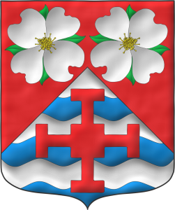Escudo de gules, mantelado en punta fajado ondado de plata y azur, en jefe dos flores de cornejo florido (Cornus Florida) al natural y en punta una cruz de san Chad de Mercia de gules.
