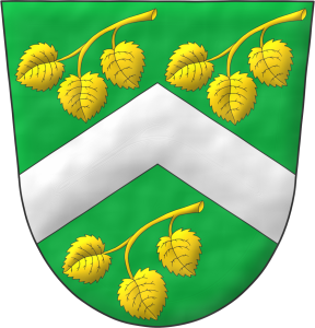 Escudo de sinople, un chevron de plata acompaado de tres ramitas de tilo, de tres hojas, arqueadas, puestas en barra de oro.