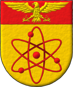 Escudo de oro, un tomo con tres orbitales de gules; en un jefe de gules, un halcn avesado de oro